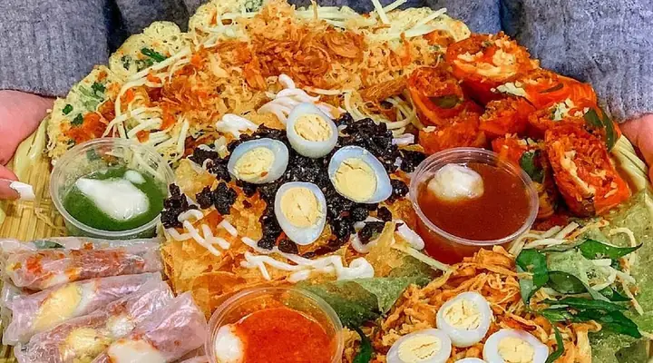Mua Bánh Tráng Trộn Làm Quà Ở Sài Gòn: Gợi Ý Địa Chỉ Tin Cậy Cho Du Khách